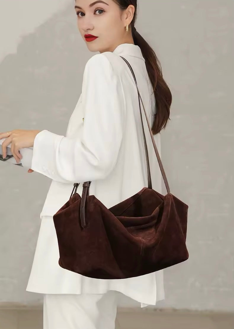 Handmade Leather Tote Bag with a Spacious Interior and Adjustable Shoulder Strap