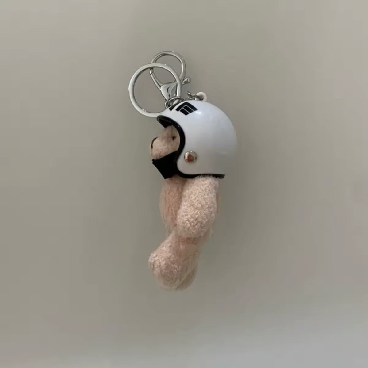 Keychain pendant for bag. Bear in helmet keychain