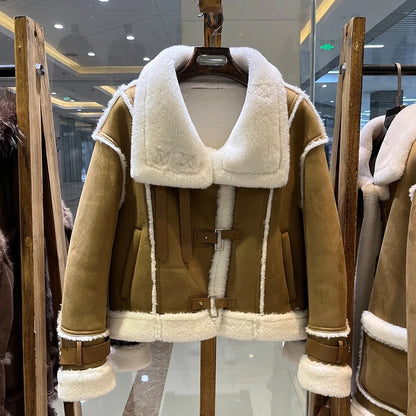 Winter luxury: faux leather shearling coat lined with wool blend. Women's shearling coat for maximum warmth and style.