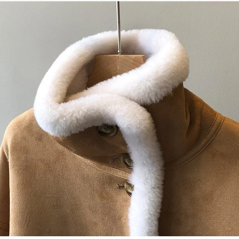 Winter luxury: faux leather shearling coat lined with real sheepskin. Double sided. for maximum warmth and style. Handmade